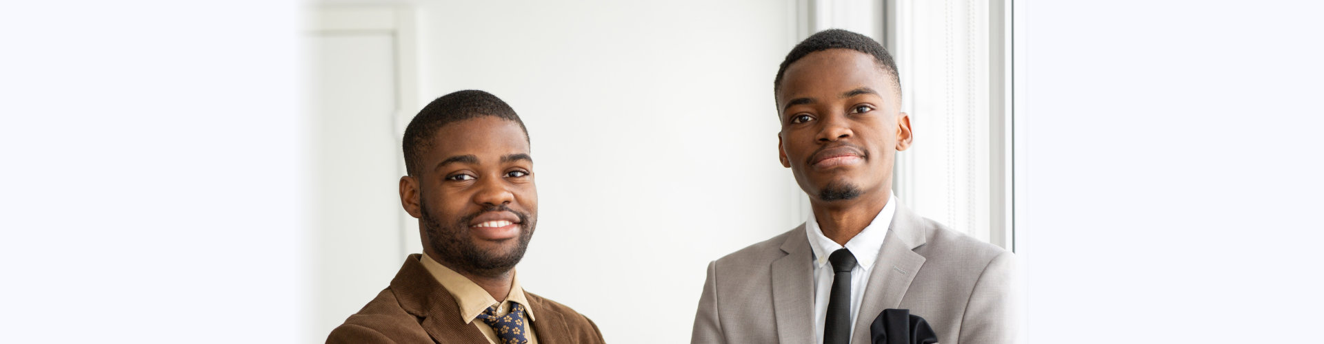 two young man smiling