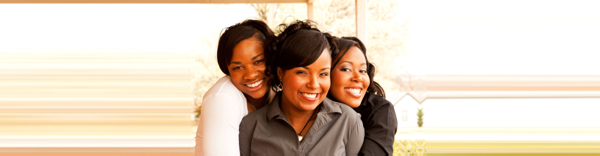 three women smiling